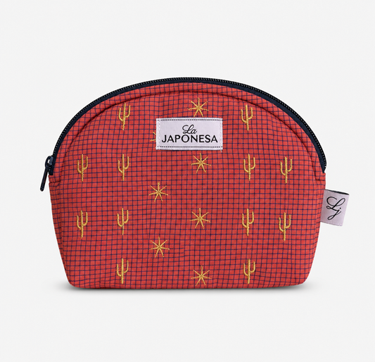 Mini pouch Arizona salmon estampado con cierre fucsia vista frontal